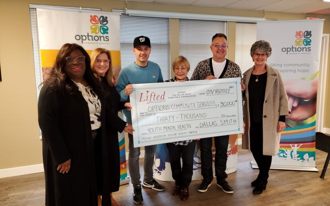 Options Community Services receives donation from Country Music Star Dallas Smith